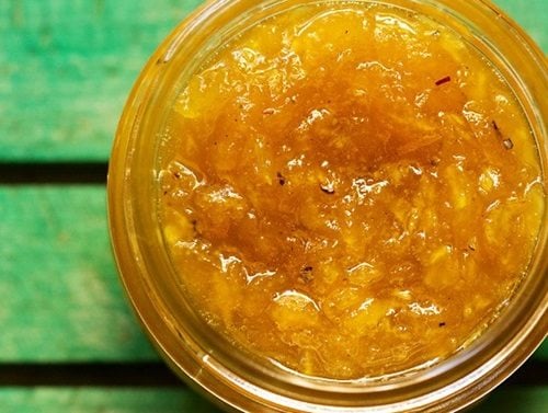 aam ka murabba in a glass jar.