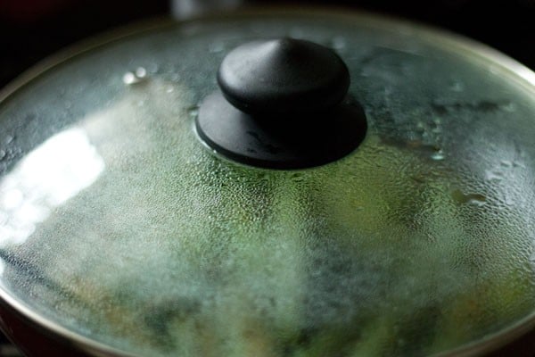 cooking bharli bhendi in the covered pan. 