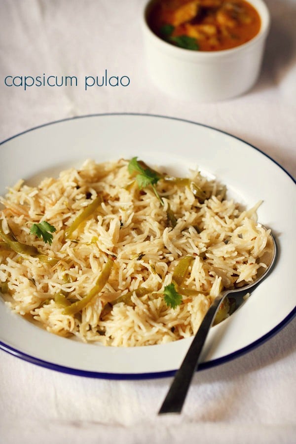 capsicum rice or bell pepper rice pilaf served on a plate.