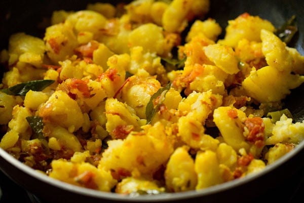 sautéing potato mixture. 