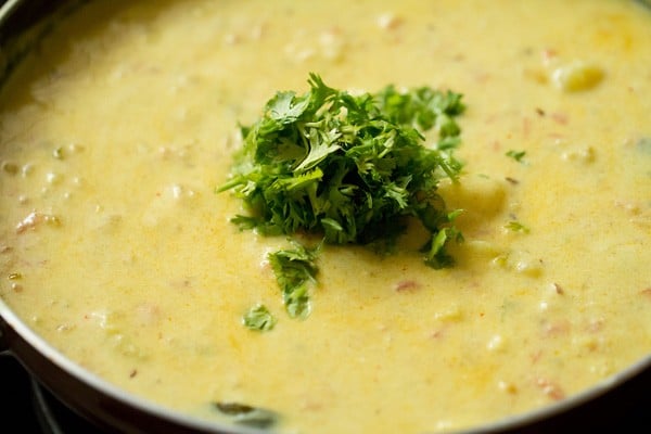 chopped coriander leaves added to dahi wale aloo. 