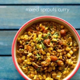 sprouts curry served in a red-rimmed ceramic bowl with text layover.