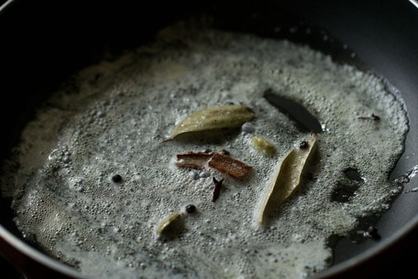 spices added to butter in the pan
