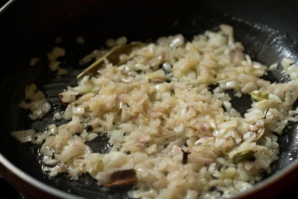 mixing onions with butter