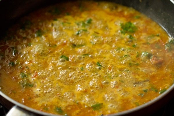 gravy simmering in the pan