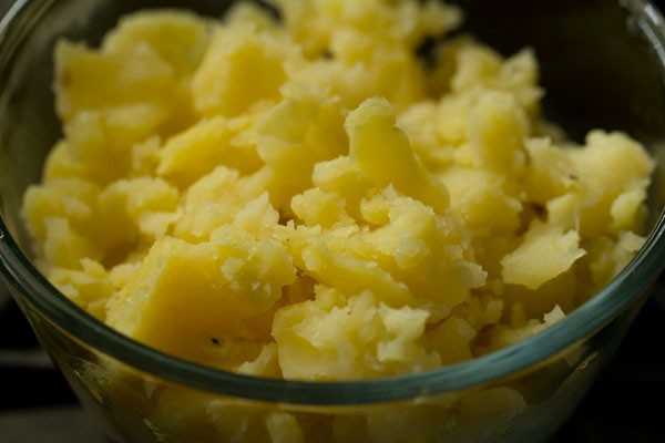 crumbled potatoes in a glass bowl.