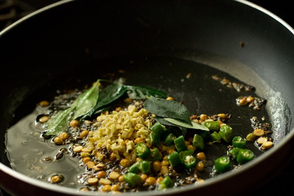 chopped ginger, curry leaves, green chillies in pan.