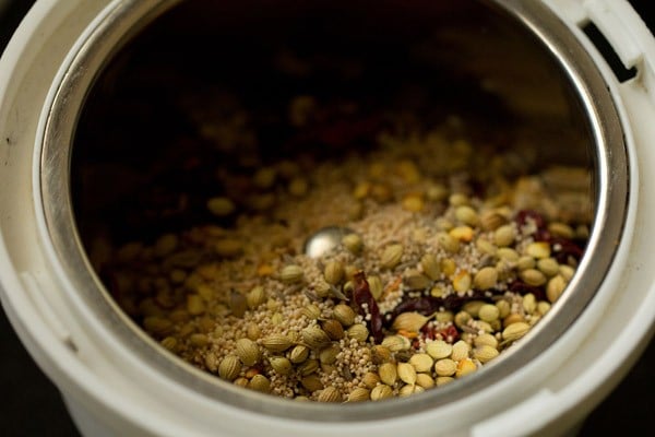 roasted spices added in a grinder jar. 