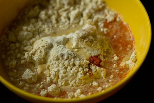 water added to the bowl with the ingredients for batter.  