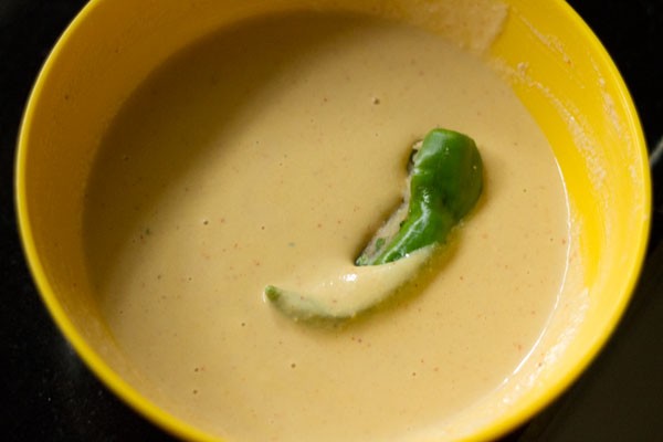 stuffed green chili dipped in the prepared batter. 