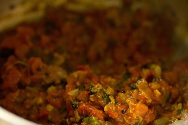 tomatoes softened and mushy to make tomato rice