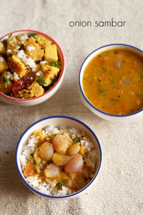 onion sambar served over steamed rice with a bowl of mixed veg and onion sambar kept on the top side and text layover.