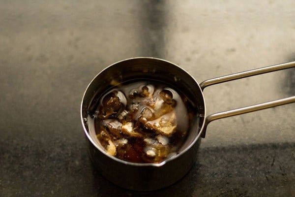 tamarind in hot water in a bowl