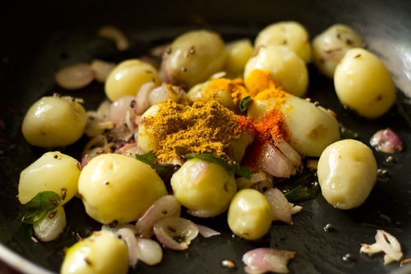 spice powders added to the baby potatoes mixture. 