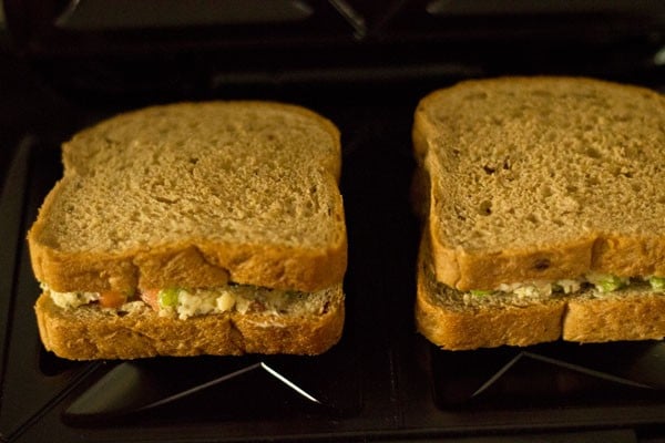 toasting capsicum sandwiches. 