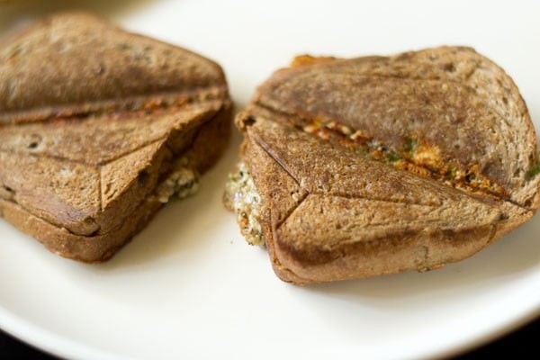 toasted capsicum sandwiches on a plate. 