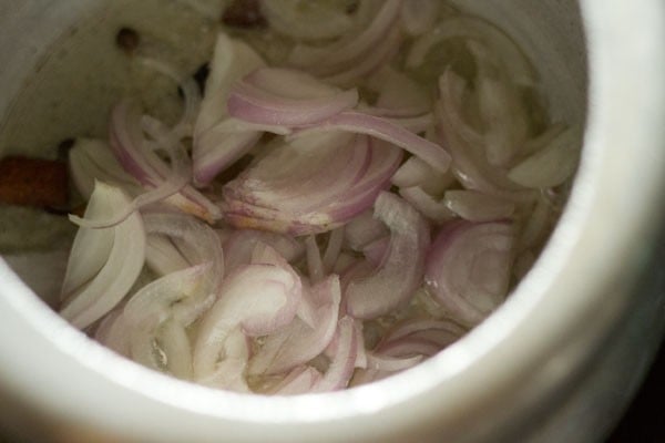 adding onions to pressure cooker