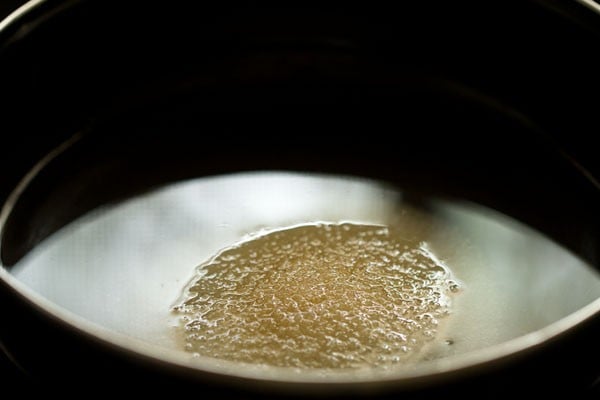 Closeup shot of sugar and water mixture in bowl.