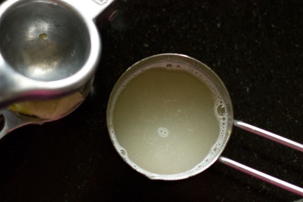 lemon juice in measuring cup
