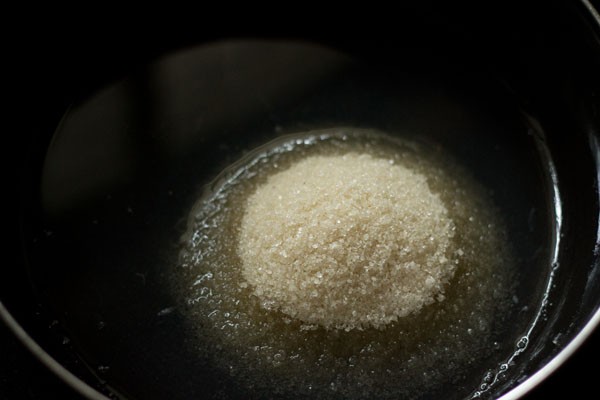 mound of sugar over lemon juice