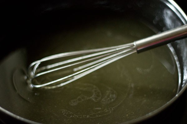 mixing oil for lemon muffin batter