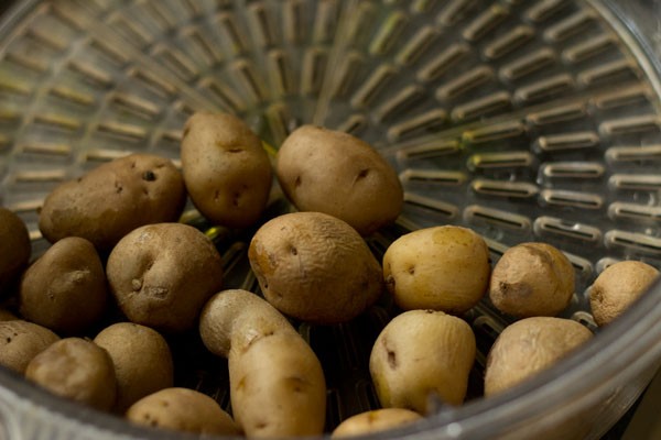 steaming baby potatoes. 