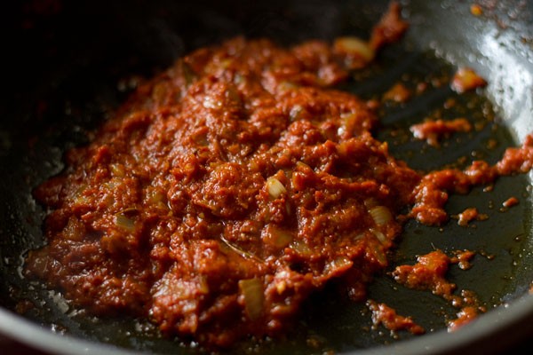 masala paste mixed well with the spiced onions. 