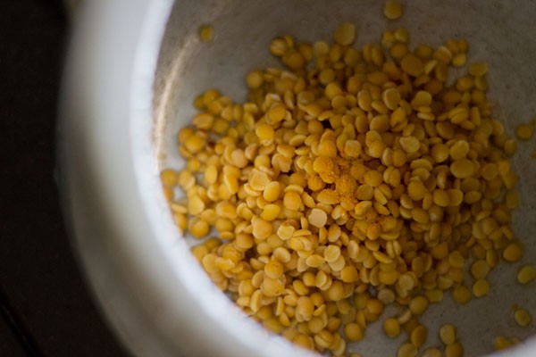 cooking tuvar dal in a pressure cooker for lemon rasam. 