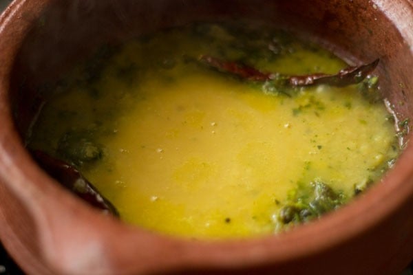 cooked dal added to the pan. 