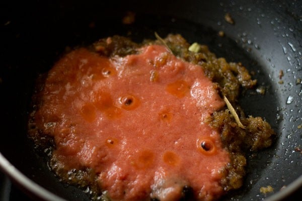 tomato puree added to pan
