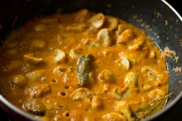 simmering gravy in the pan.