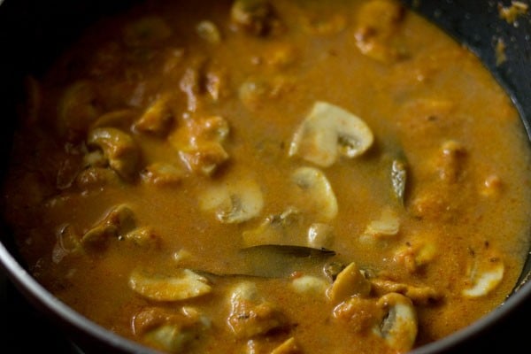 water added to mushroom masala in pan