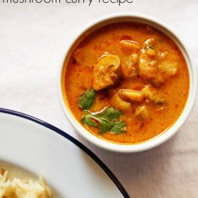 mushroom masala garnished with coriander sprigs in a white bowl on a white board