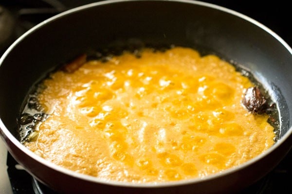 prepared paste added in the pan to make biryani gravy. 