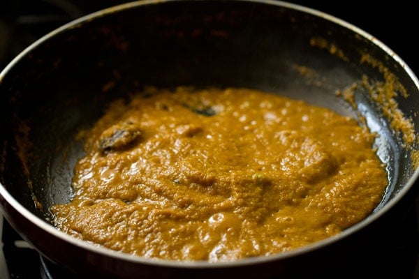 spice powders stirred well in the masala paste. 