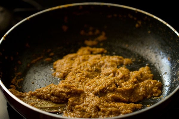 sautéing spiced masala paste for shorba recipe. 