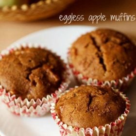 eggless apple muffins served on a white plate