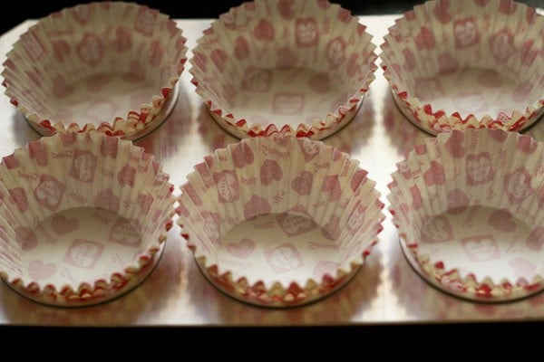 muffin liners on a baking tray