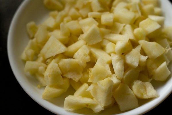 chopped apples on a white plate