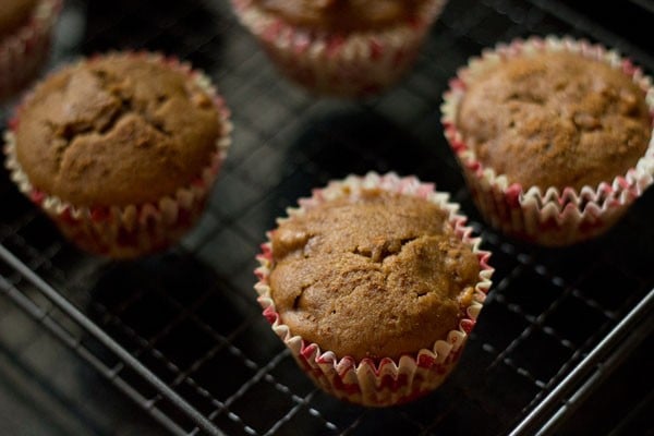 apple muffins on a wire rack