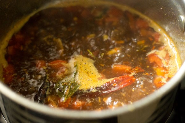 simmering garlic rasam. 