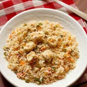 paneer fried rice served in a white plate