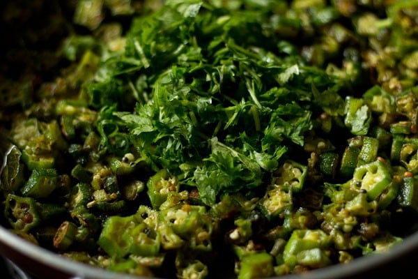 chopped coriander leaves added to cooked vendakkai poriyal. 