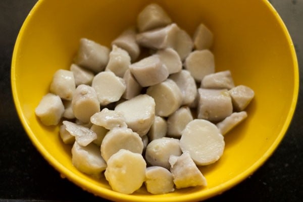 peeled and sliced arbi in a bowl 