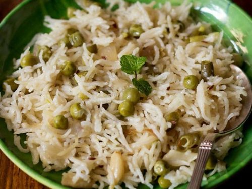coconut milk rice served on a green plate