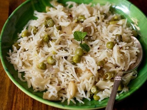 coconut milk rice served on a green plate
