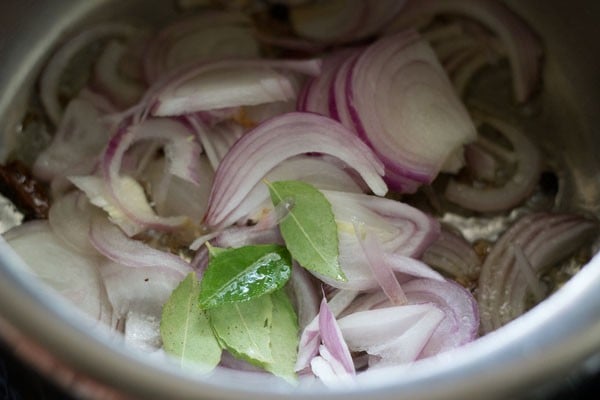 adding onions and curry leaves