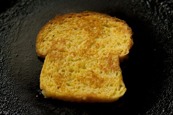 toasting the bread slice till evenly golden from both the sides. 