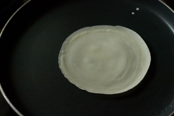 cooking spring roll sheet on the pan. 