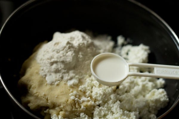 adding milk to the bowl. 